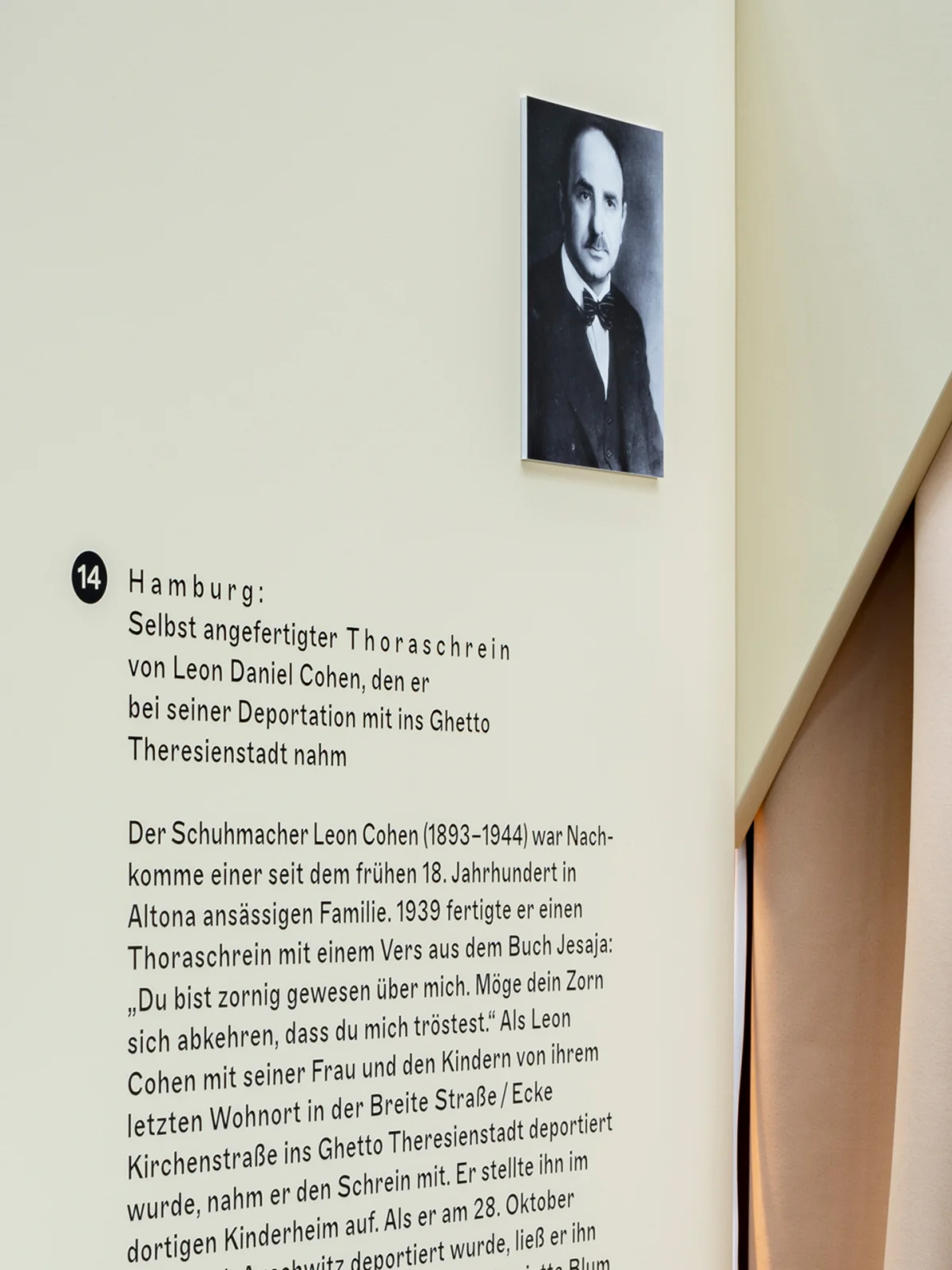 Close-up of the panel about Daniel Cohen’s handmade Torah ark, with a historical portrait and biographical text.