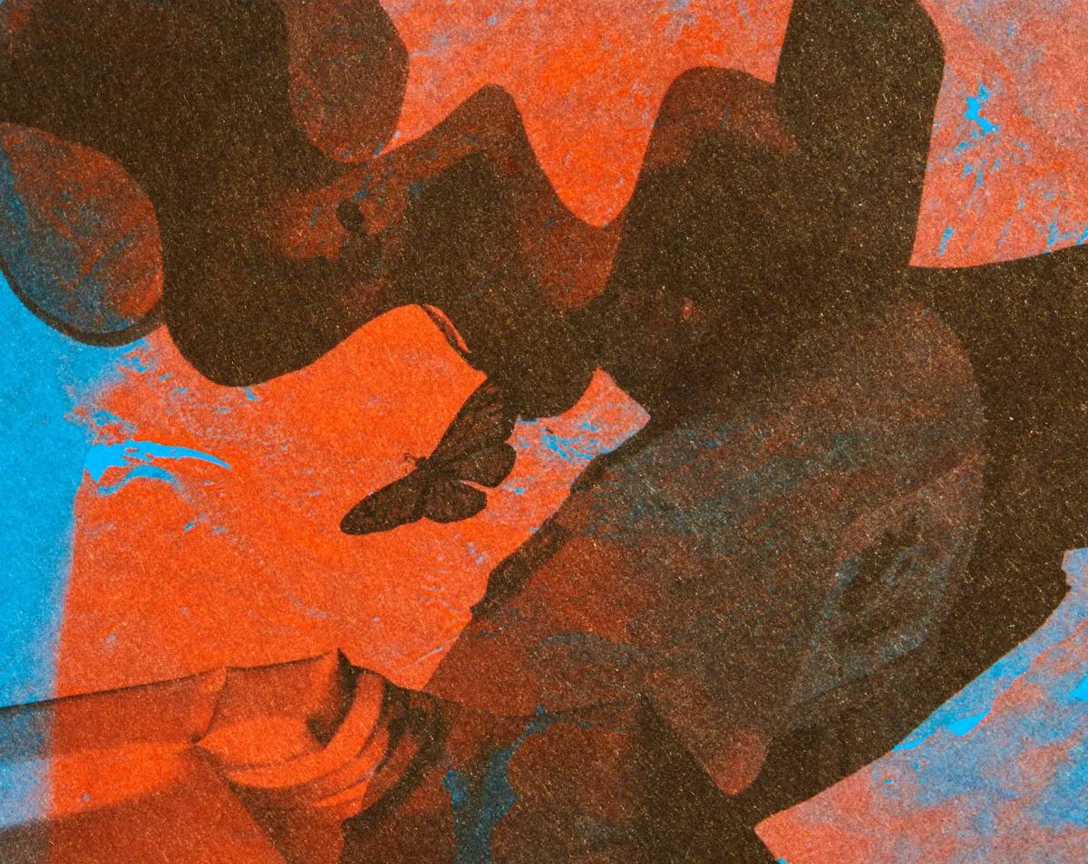Close-up of a grainy orange, black and turquoise image collage in “Specology”.