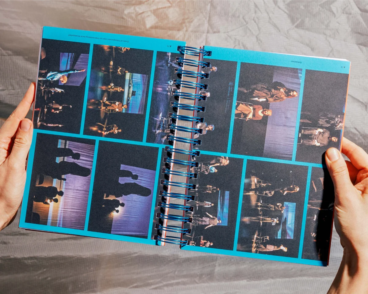 Open “Specology” volume with a sequence of stage photographs framed in turquoise.